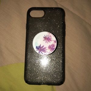 An iPhone 7 phone case with a popsocket